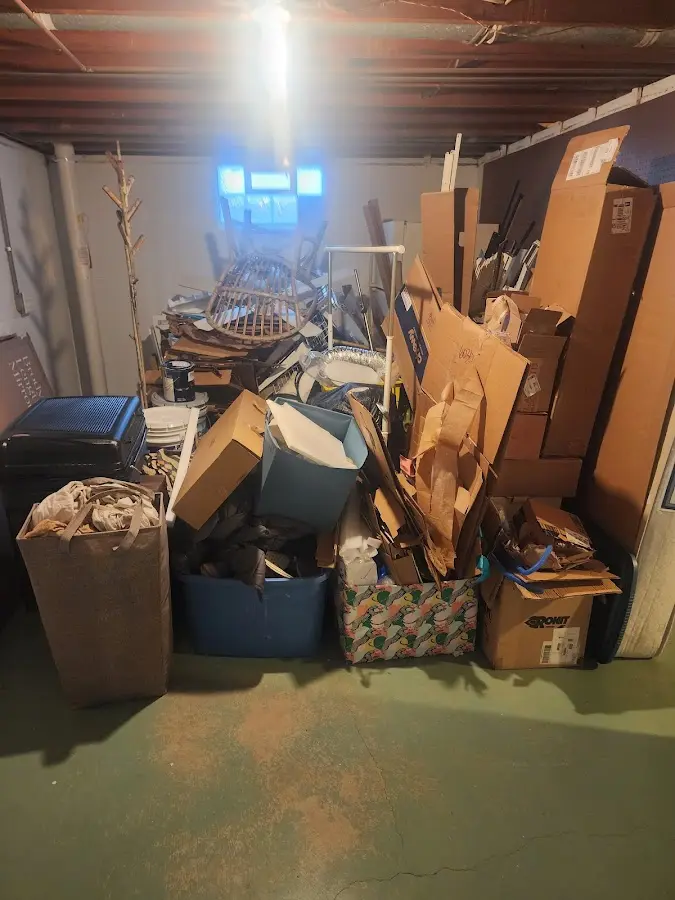 Roll-off dumpster container at job site for 8 Yard Dumpster Rental in Canton